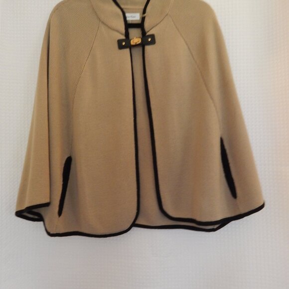 Calvin Klein Cape, tan with black piping on trim and armslits. - Picture 1 of 2